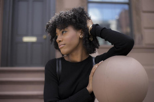 woman wearing long sleeve cotton black top